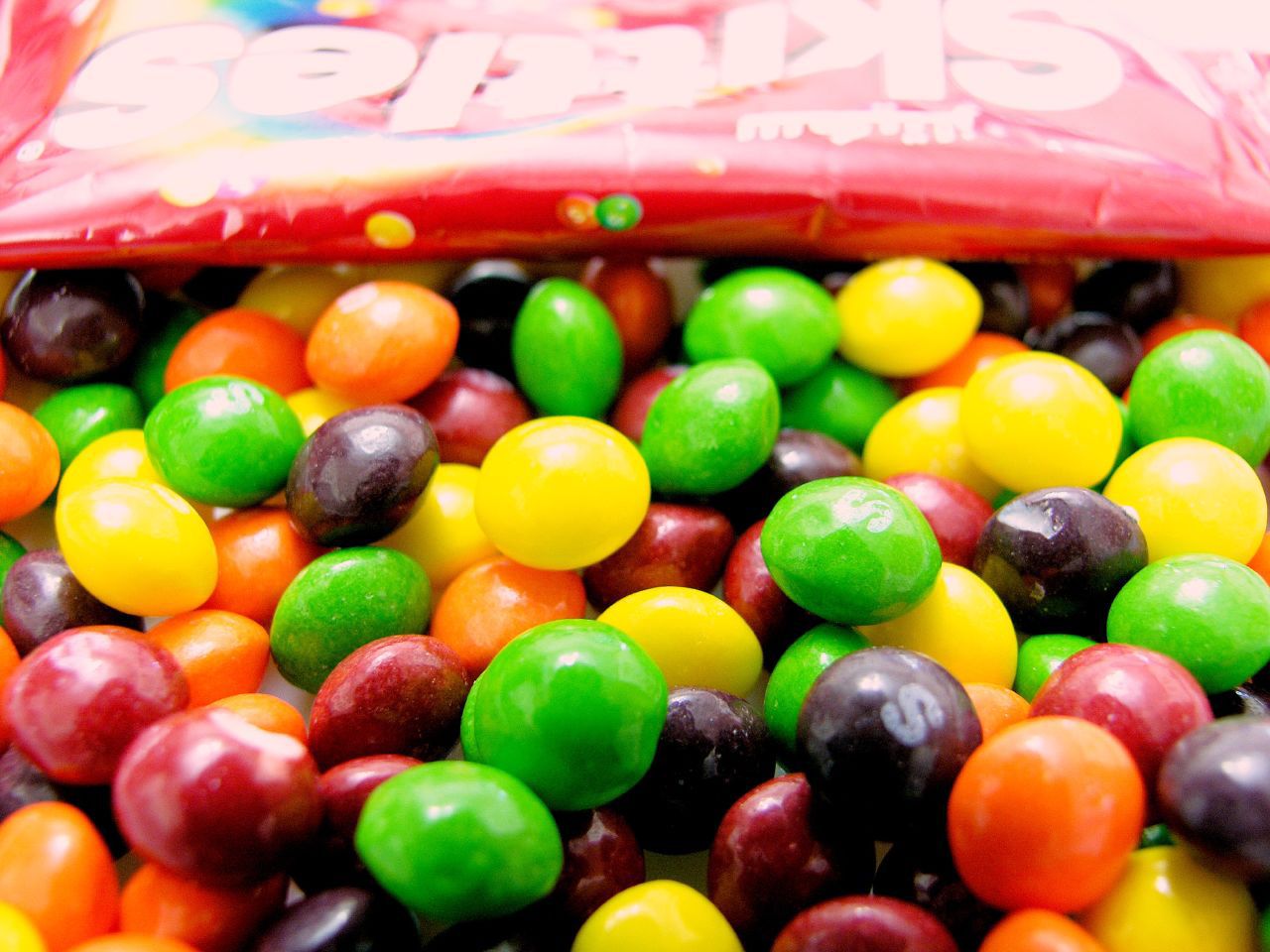 How do skittles end up as cattle feed?