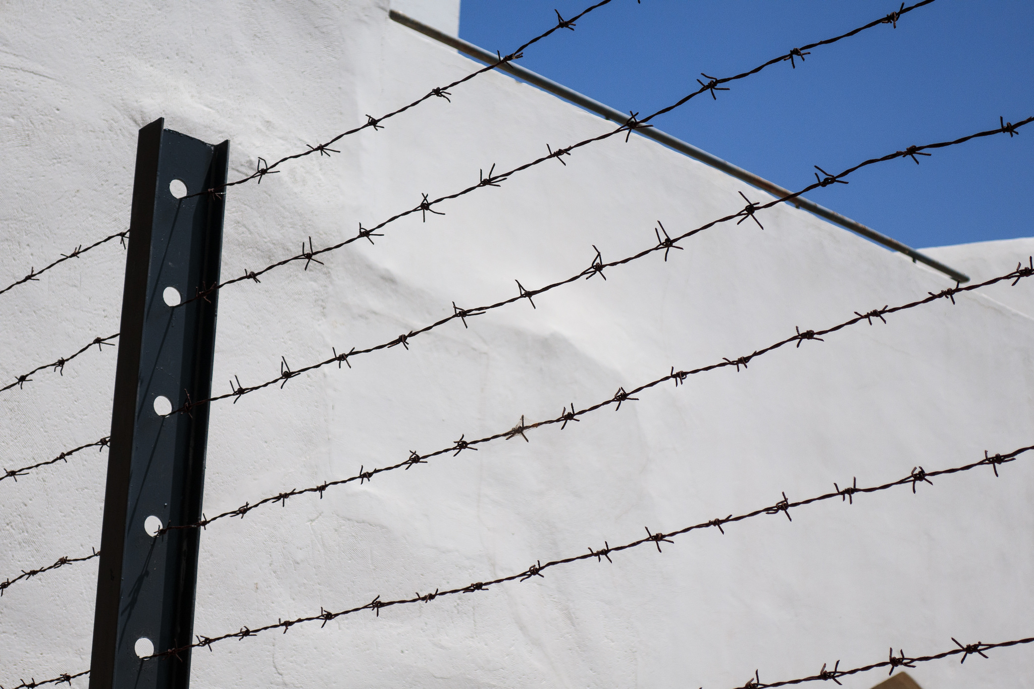 barbed wire outside a prison