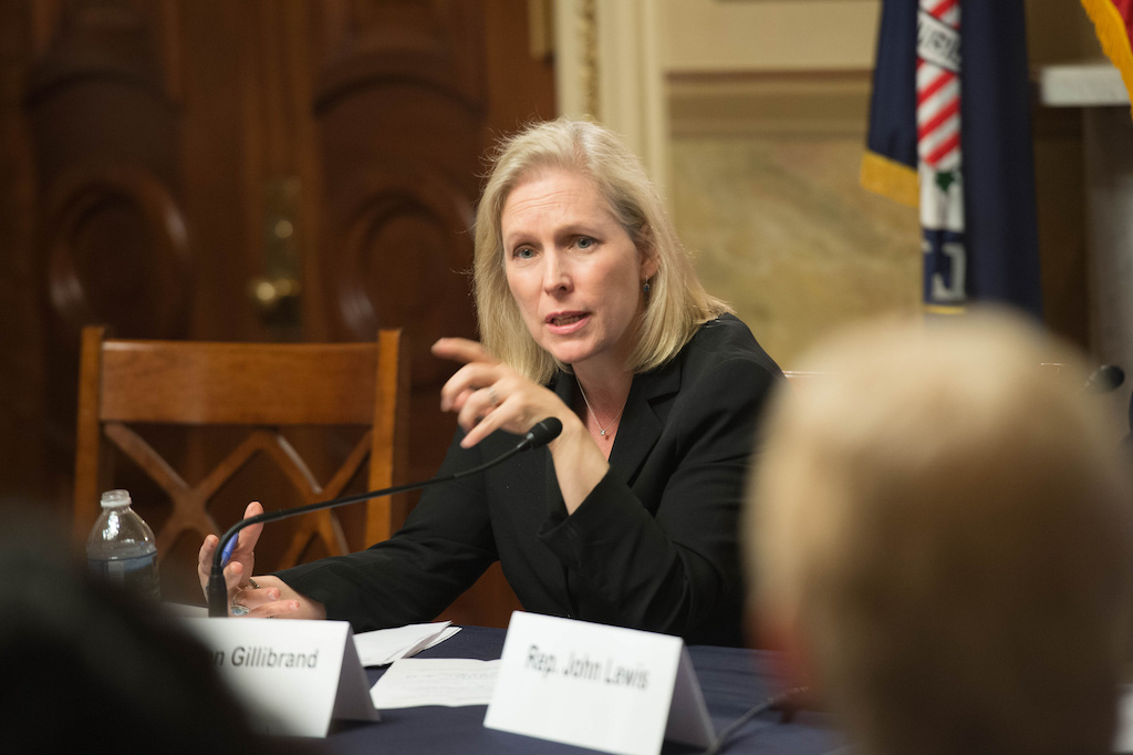 Kirsten Gillibrand speaking into a microphone