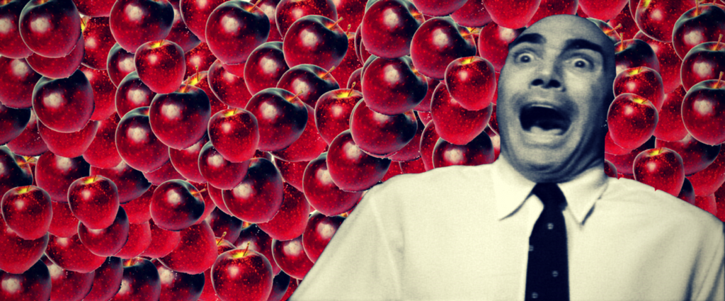 bald man is horrified by red delicious apples