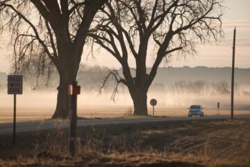A road outside Manhattan, Kansas. Rural depopulation and farming, May 2018.