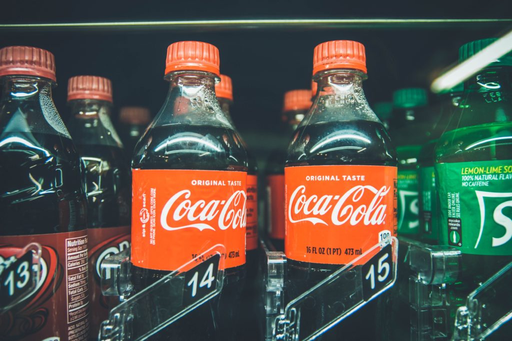 soda bottles in a vending machine