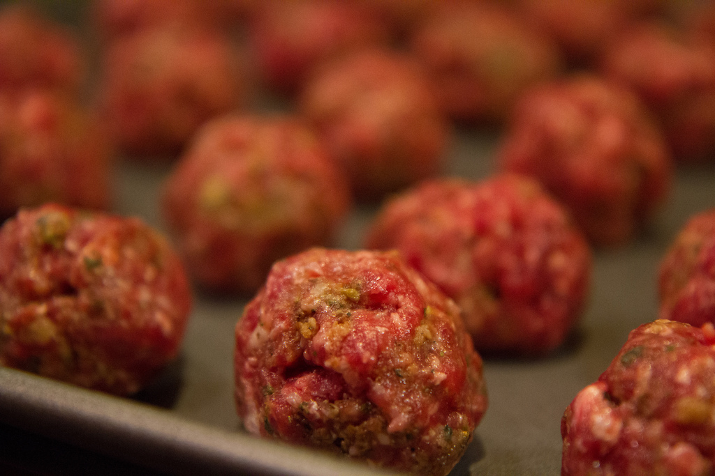 A plate of raw meatballs