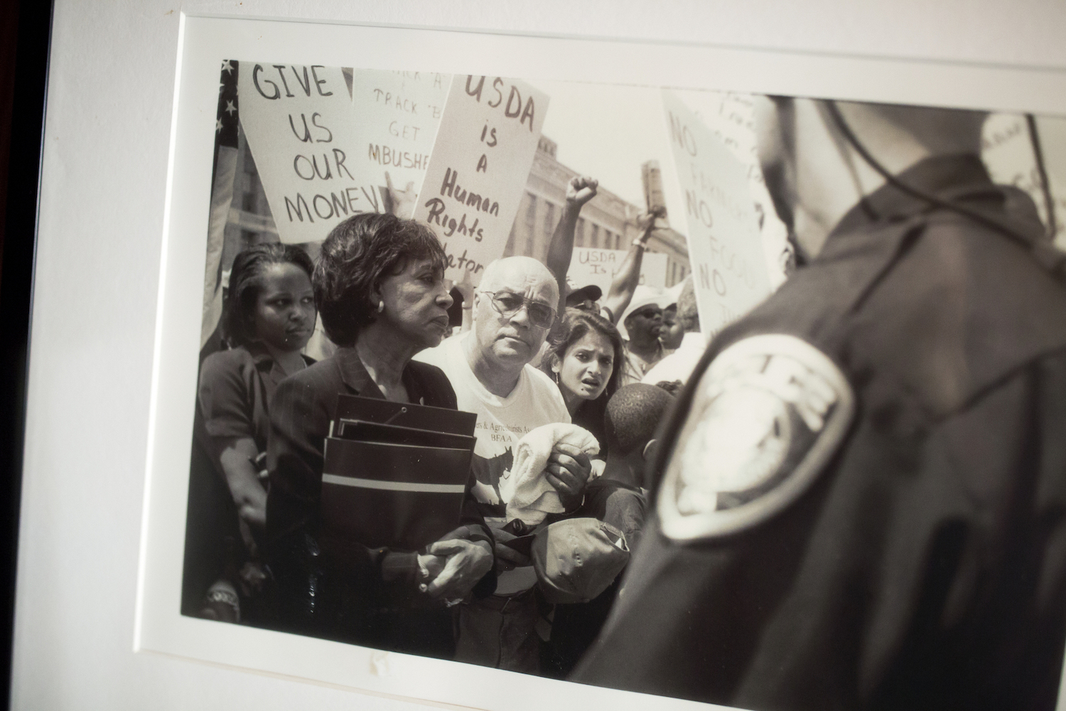 A photo of civil rights and social justice activist Gary Grant and Representative Maxine Waters from May of 2000 hangs in the History House museum