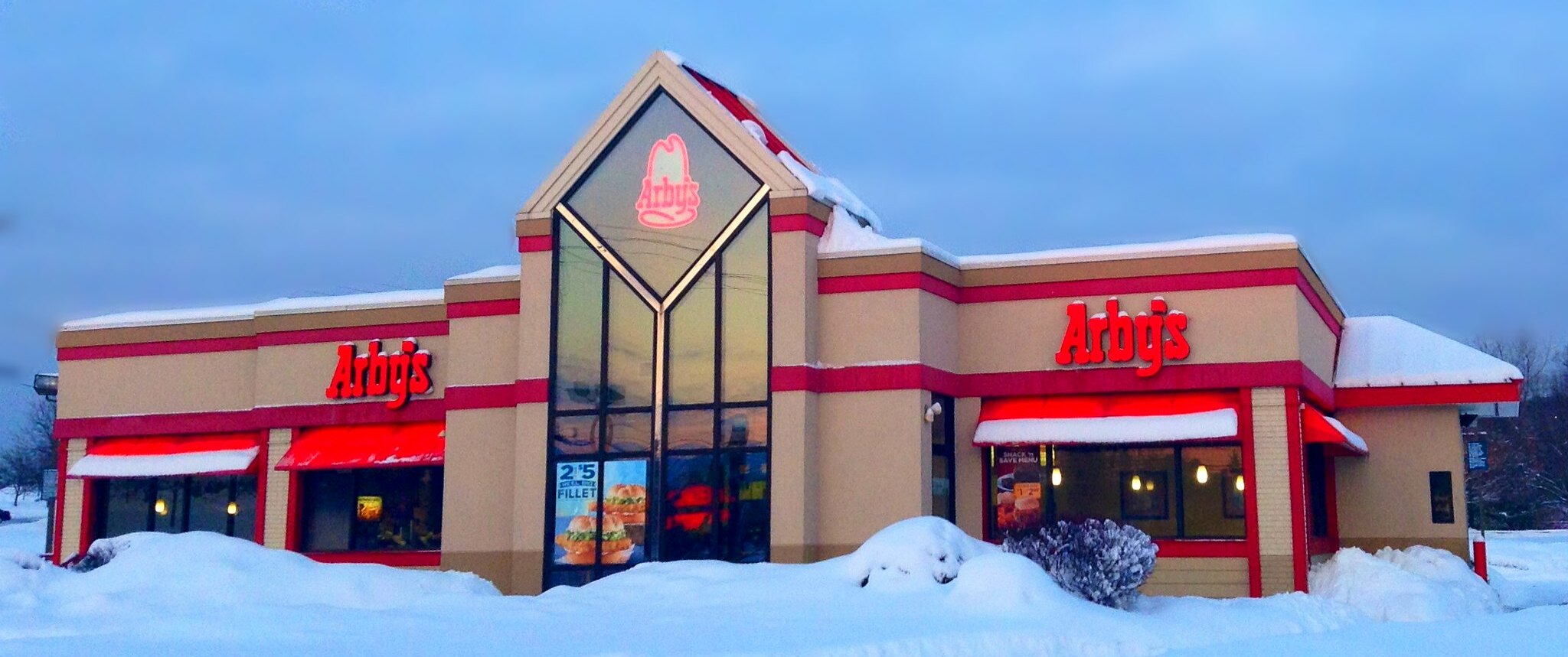 Arby's storefront in the snow.