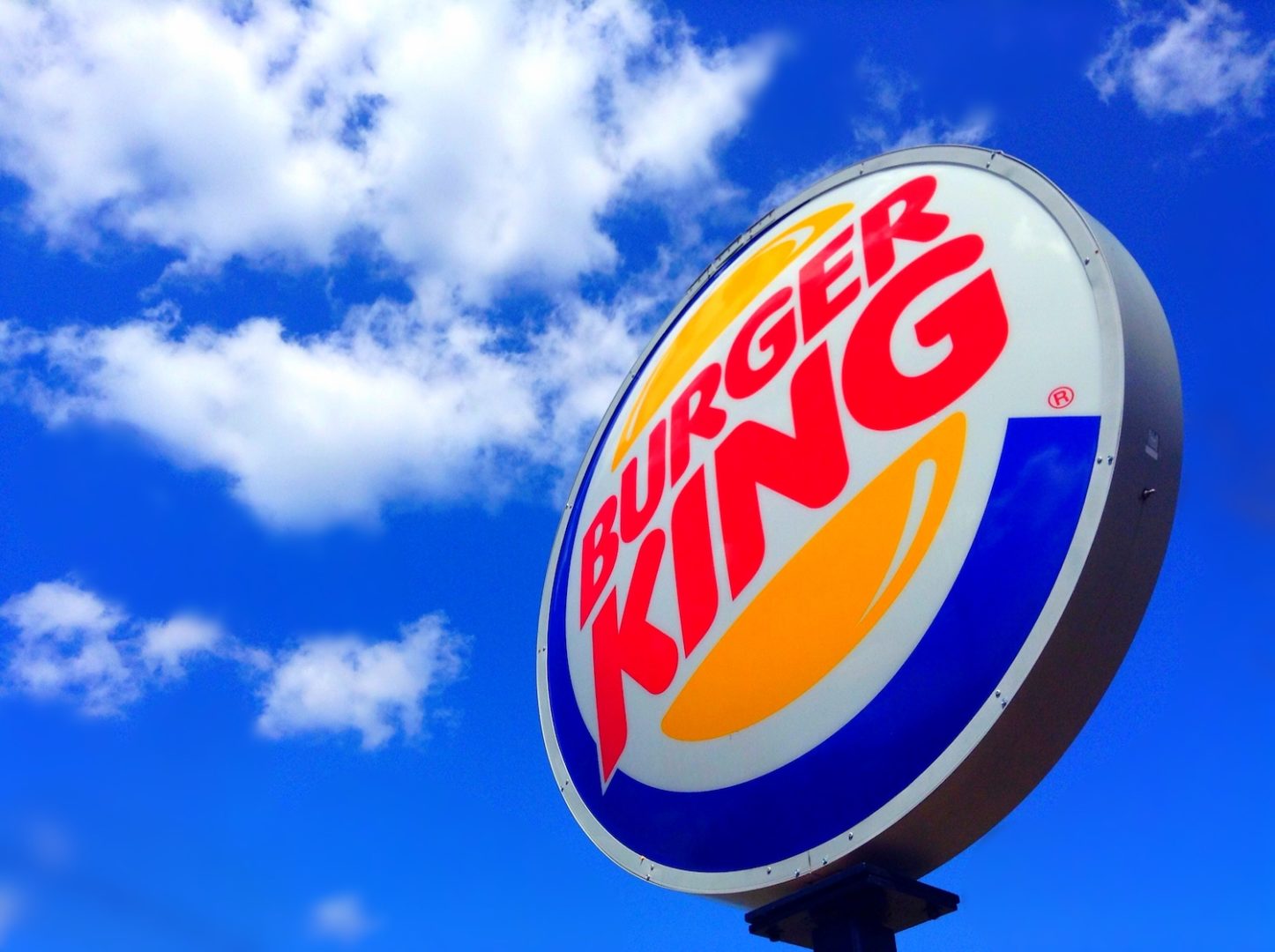 Burger King sign with clouds