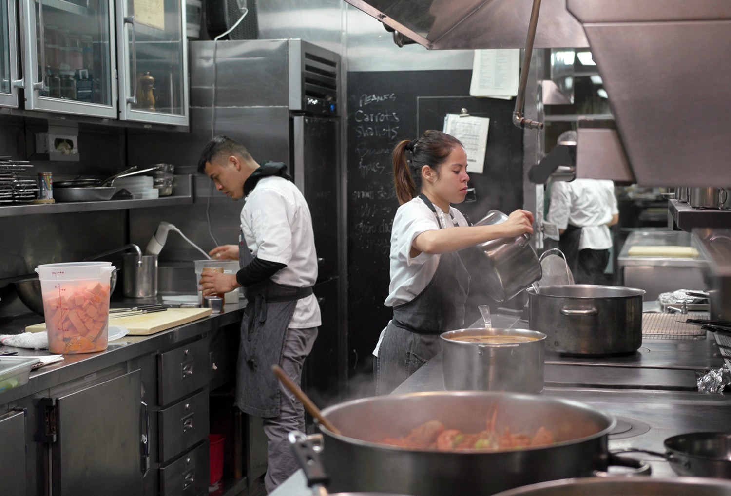 Chef pours water