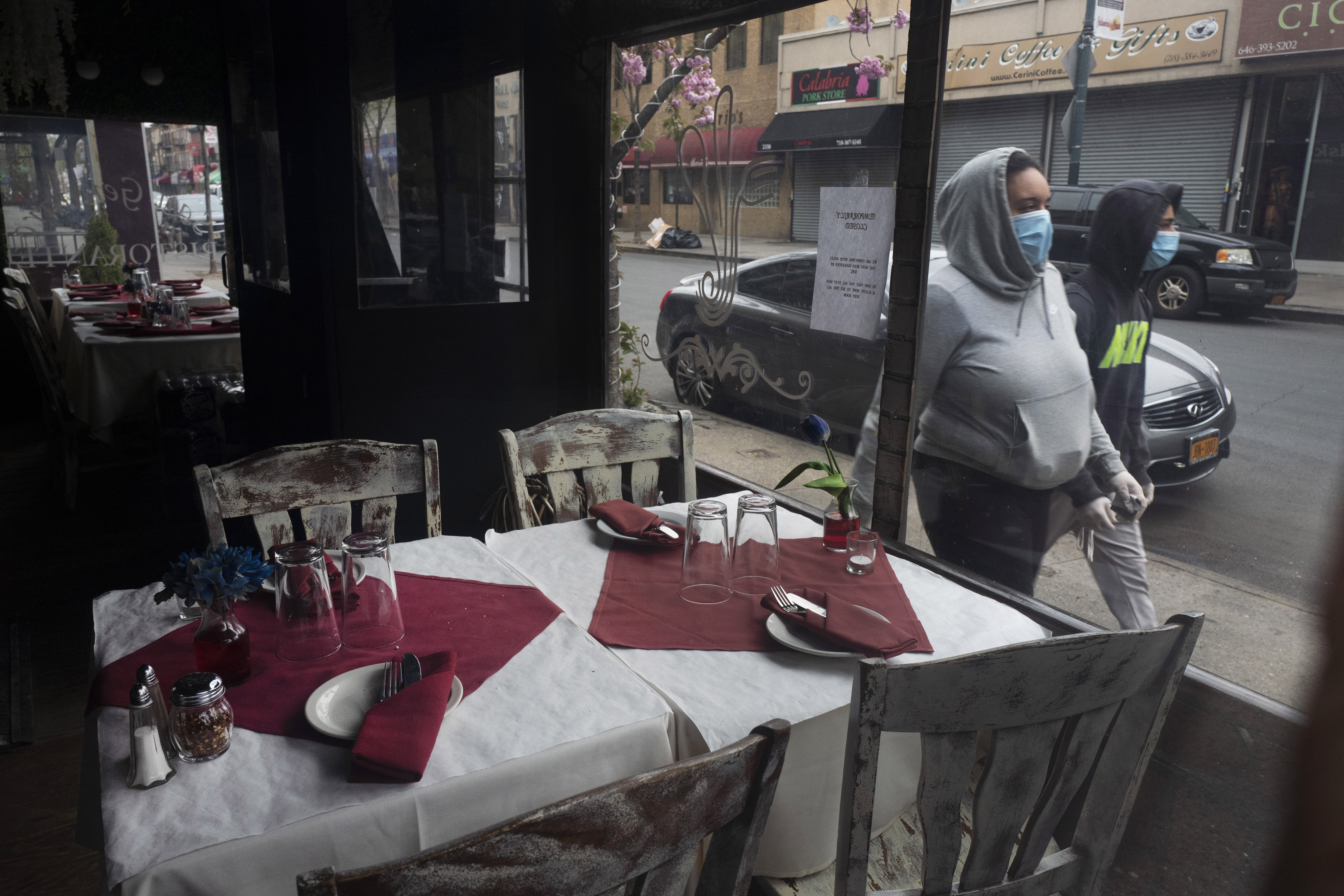 San Gennaro restaurant is closed but the tables are set in the Bronx borough of New York on Friday, April 17, 2020, during the coronavirus pandemic.
