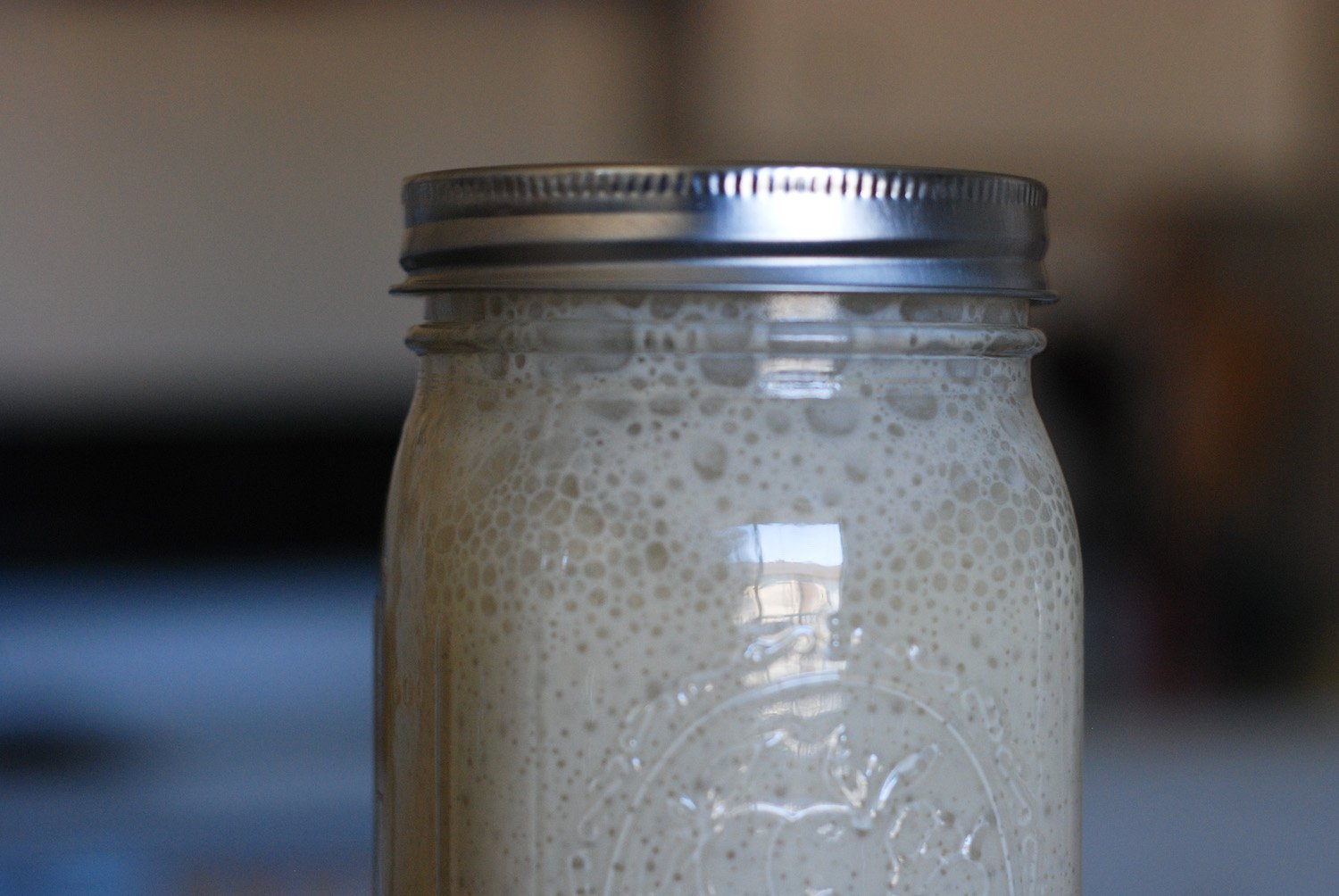 a sourdough starter in a mason jar April 2020