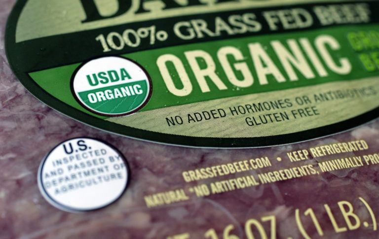 A "USDA Organic" label is printed on the label of a pound of ground beef, in Walpole, Mass. July 2020