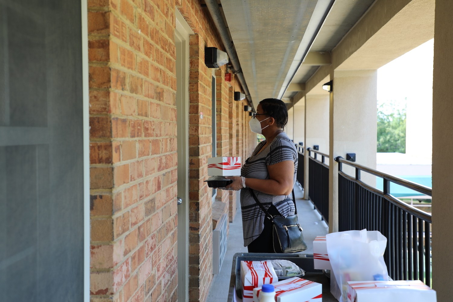 delivering dining hall meals door to door at NC State University August 2020