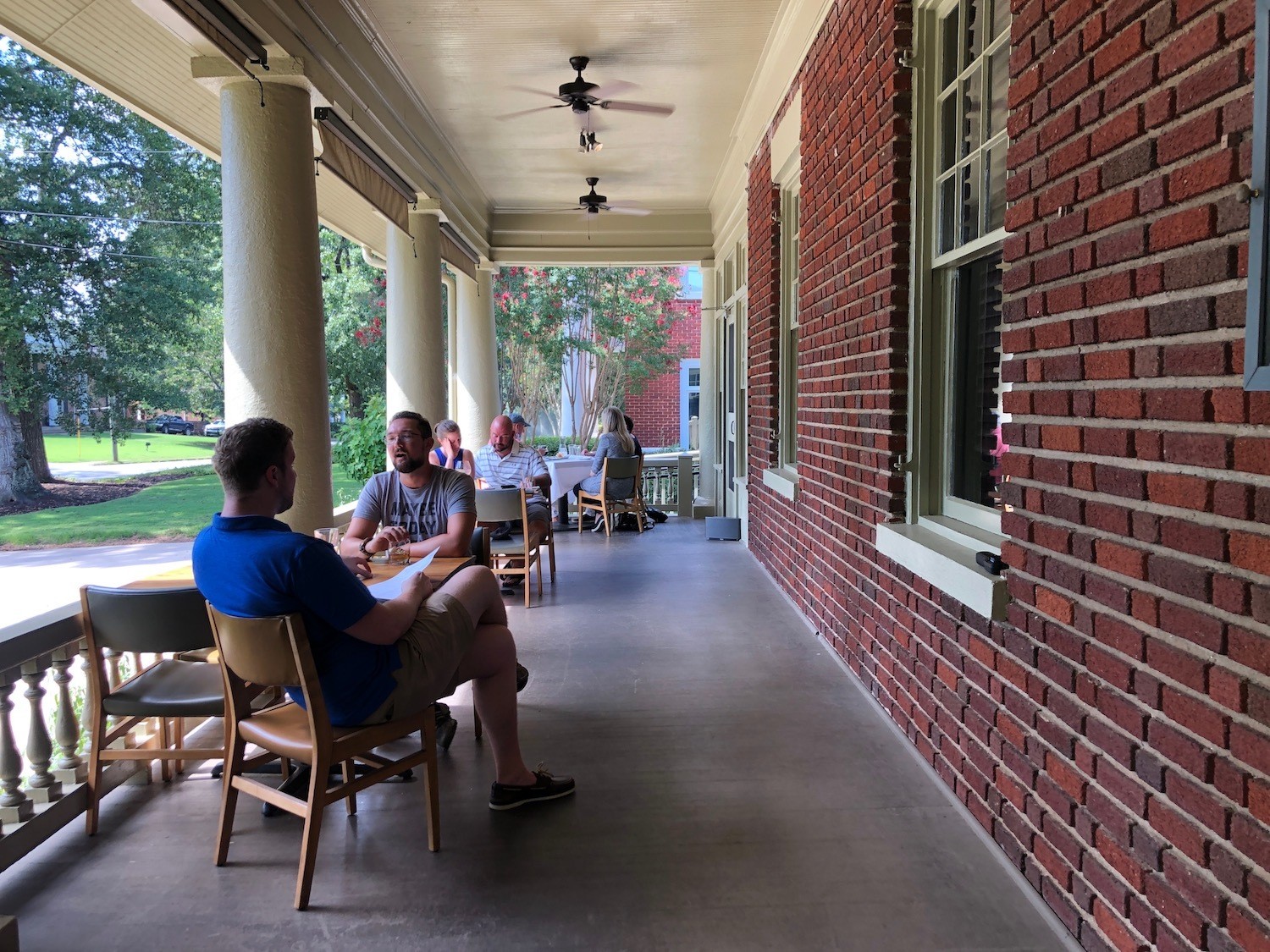 Porch outdoor dining at Five & Ten, a restaurant in Athens, Georgia. September 2020