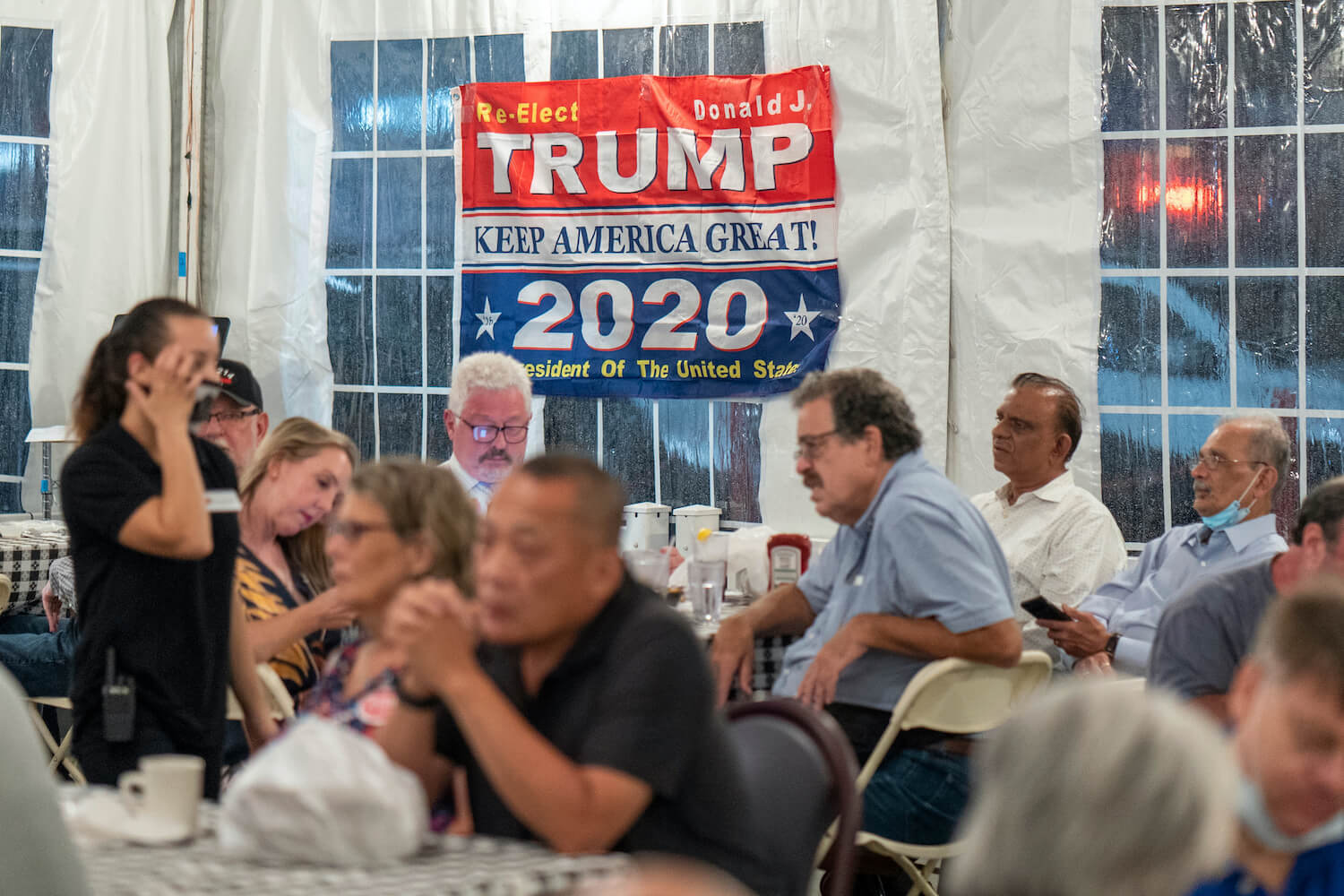 A banner for Trump/Pence US election ticket seen during a Steve Bannon Speaking Engagement on Zoom with Queens Village Republican Club in Triple Crown Diner, Middle Village, Queens. October 2020