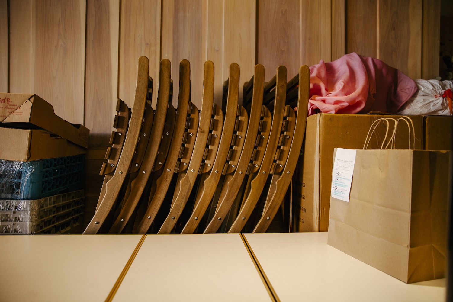Stacked dining chairs inside Kismet. December 2020