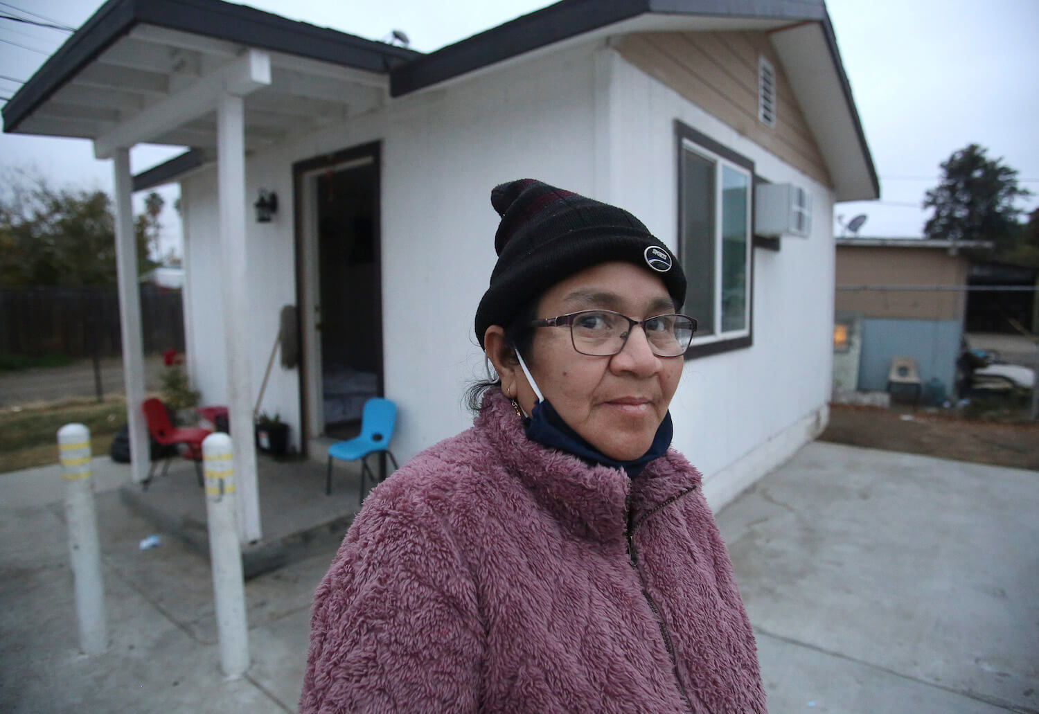María Reyes, who tested positive for COVID-19, quarantines at her home in Mendota on Dec. 12, 2020. Reyes declined a hotel room with Housing for the Harvest out of concern she would have to leave her teenage daughter. December 2020