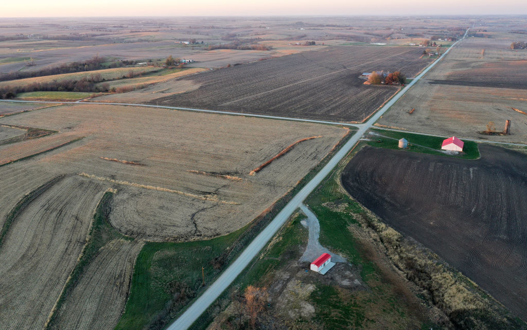 An aerial view of mostly harvested farmland in Lacano, Iowa, at sunset in the final days before the 2020 presidential election.