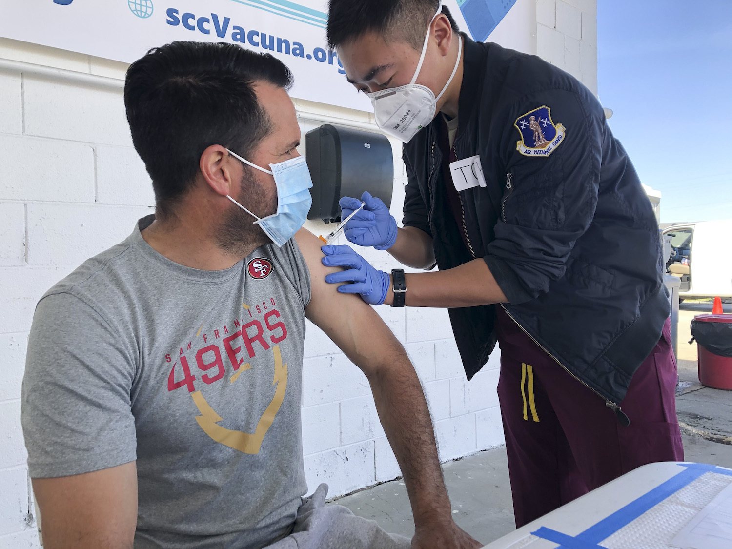 Mauricio Chavez of Hollister gets a COVID-19 vaccine at Monterey Mushrooms in Morgan Hill on Feb. 28, 2021. He works at a neighboring mushroom farm. Many California farmworkers still face obstacles getting the vaccine.