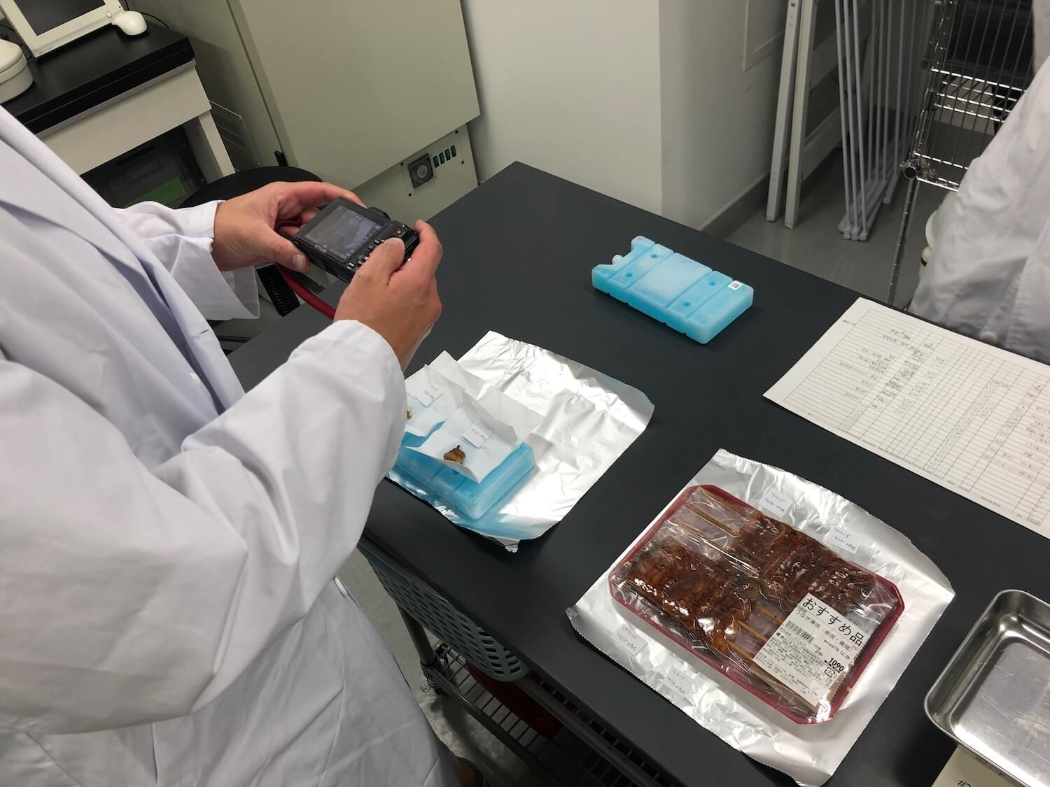 Graduate students at Kitasato University’s Ocean Research Institute run DNA tests on unagi samples. March 2021