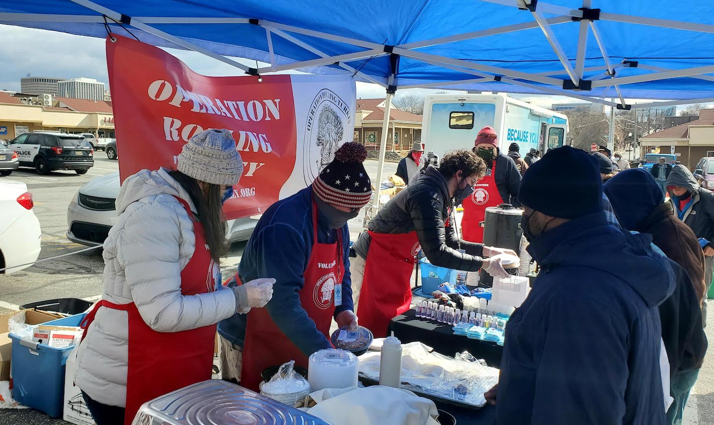 Volunteers pass out meals for Operation Rolling Turkey. November 2020