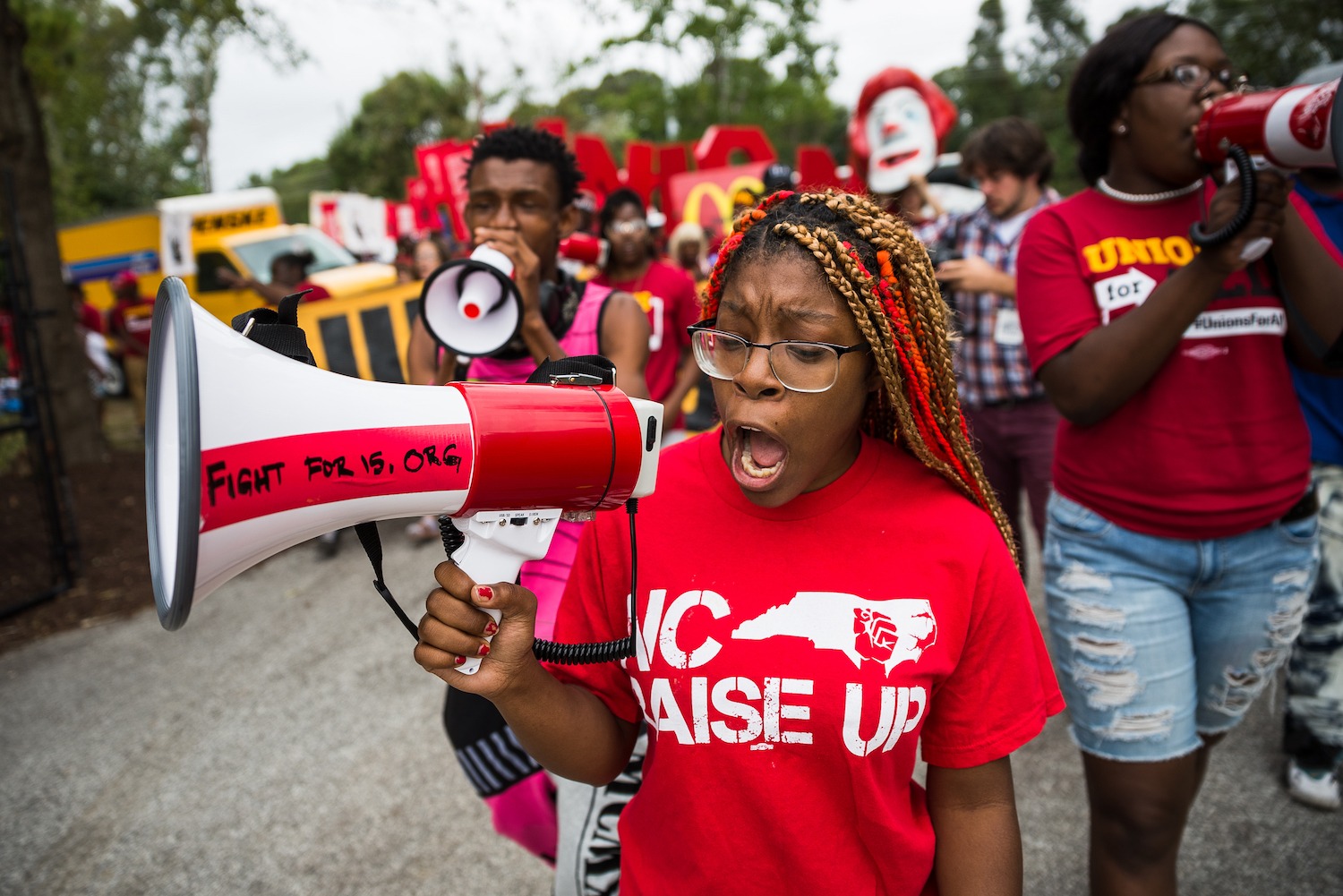 Eshawney Gaston on the megaphone in a fight for $15 protest in North Carolina.