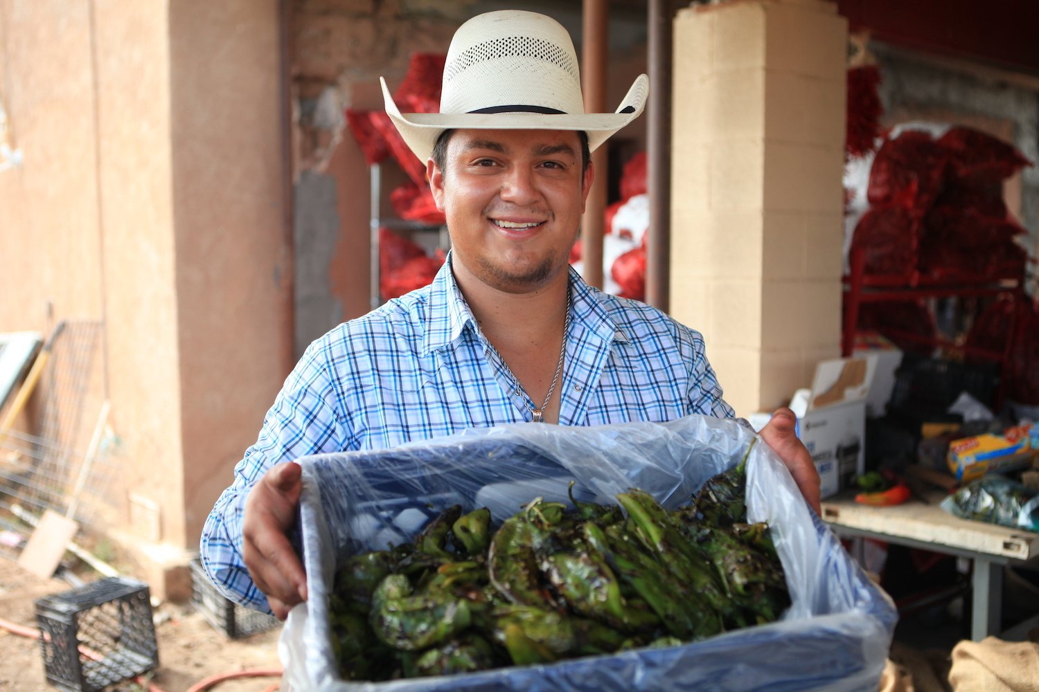 Jessie Moreno with roasted green chiles.