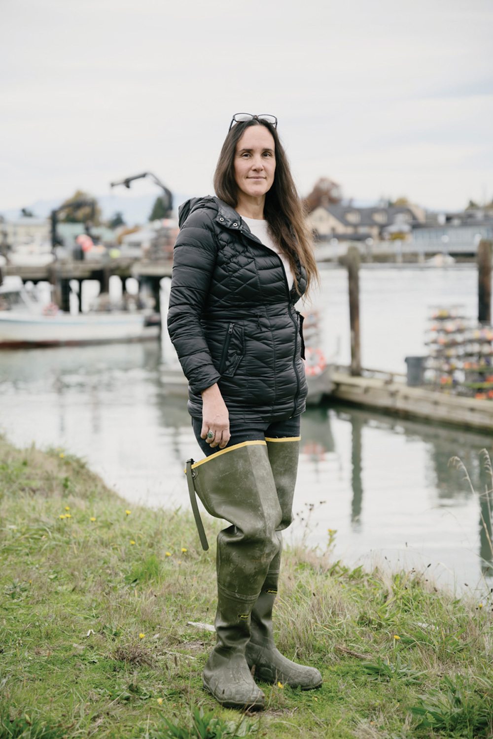 Laura Wilbur (Swinomish), whose grandfather helped build the salmon-processing facility where the Swinomish Shellfish Company is located, now works for the company. 2021