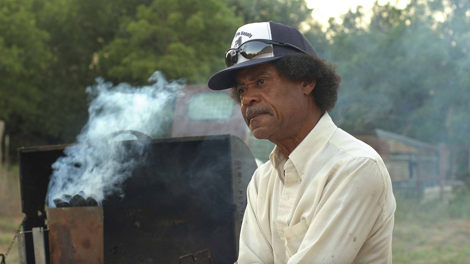 Jimi Vivens, pictured in July 2019 resting after a day’s work, has been farming in rural Texas for more than four decades.