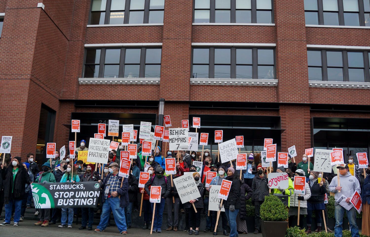 Workers gather in protest in front of Starbucks headquarters in Seattle, WA. 021522