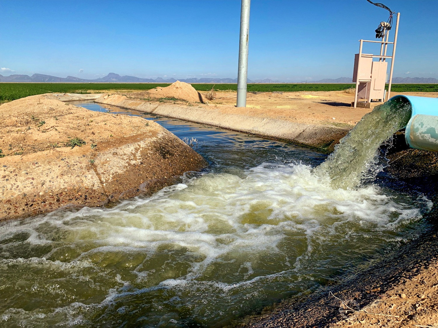 As water supplies from the Colorado River drop the demand for Arizona’s finite reserves of groundwater are increasing. Here, pumping fills an irrigation canal near Gila Bend, Ariz.