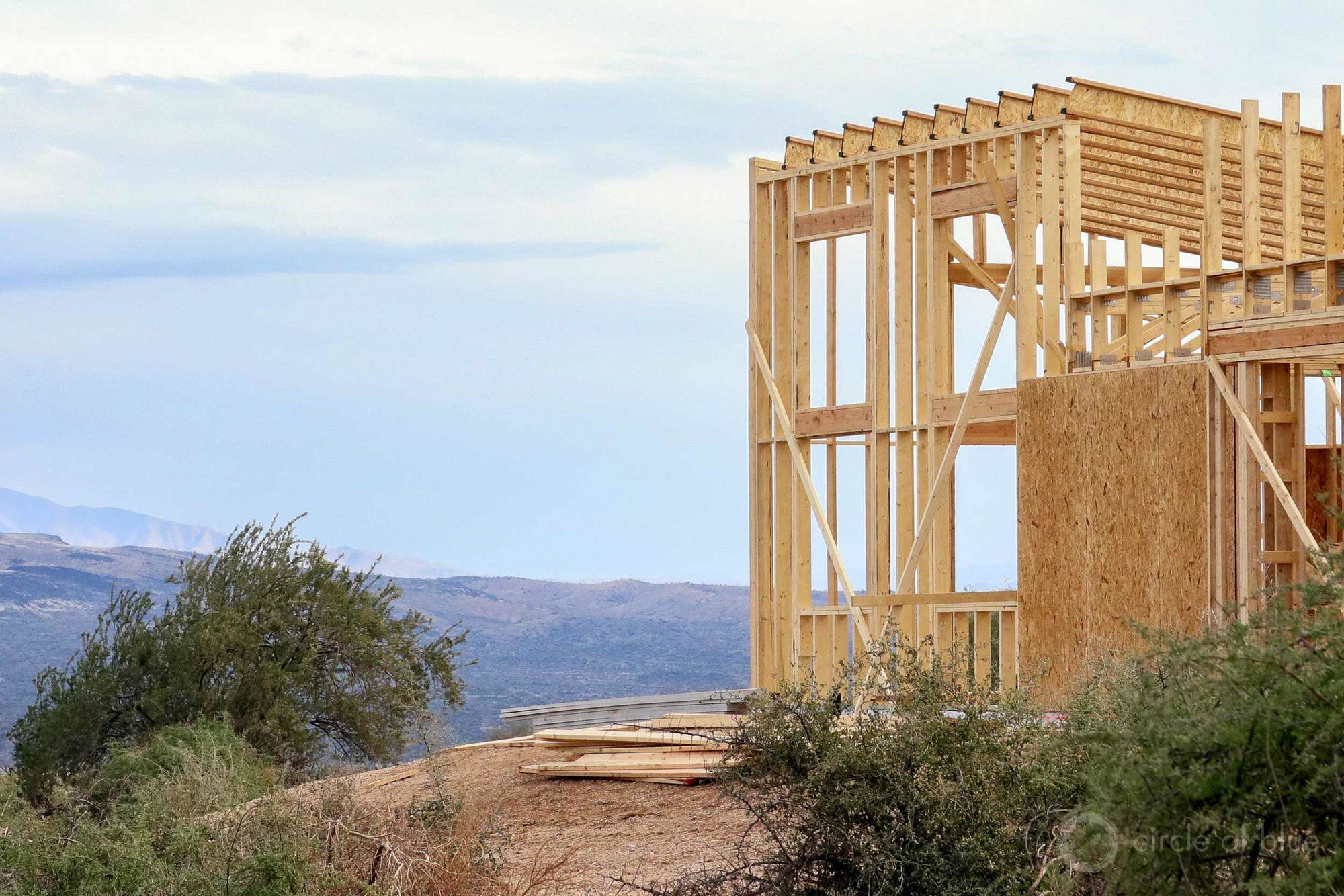 A home is under construction with only wood exposed in the Rio Verde Foothills.